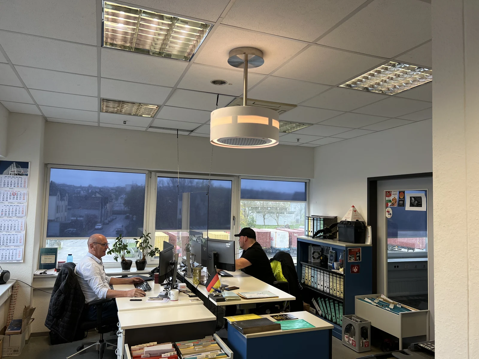 dp air purifier above occupied office workstations