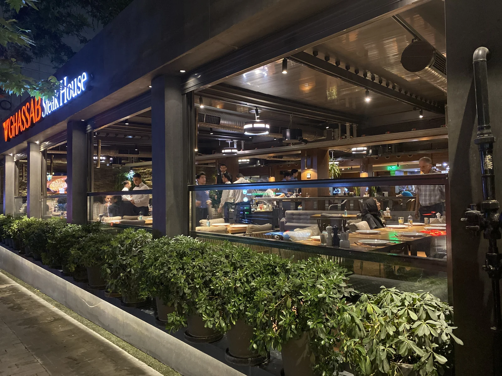 Exterior view of a restaurant with visible dp ceiling air purifiers
