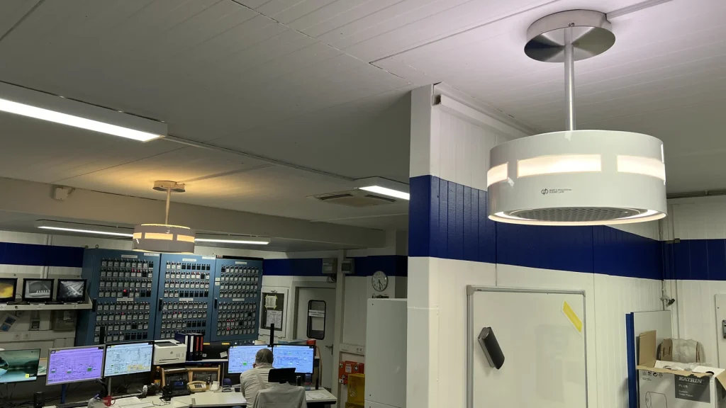 Two dp ceiling air purifiers in an industrial control room